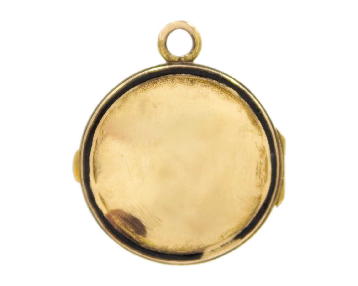 Click H Locket Lot 101 - A Victorian high-purity gold locket pendant.