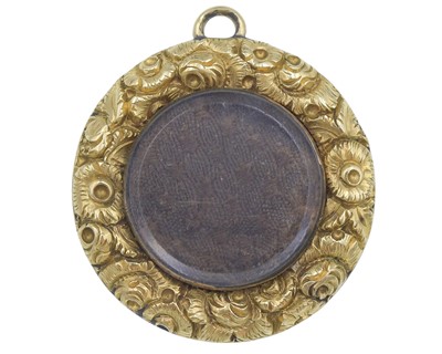 Lot 108 - An early 19th-century high-purity gold locket pendant.