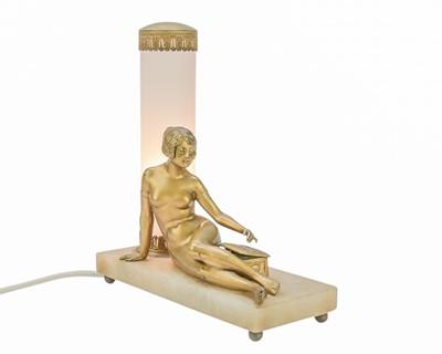 Lot 55 - An Art Deco gilt finish bronze mounted table lamp.