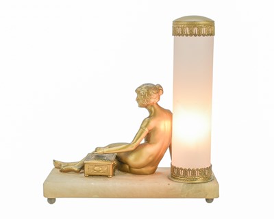 Lot 55 - An Art Deco gilt finish bronze mounted table lamp.