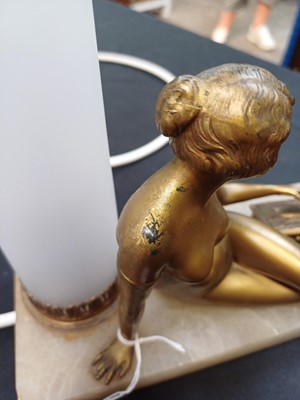 Lot 55 - An Art Deco gilt finish bronze mounted table lamp.