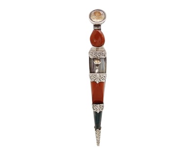 Lot 4 - A Scottish silver and hardstone kilt pin.