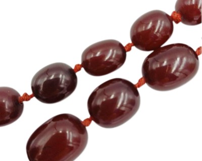 Lot 82 - A bakelite cherry amber style bead necklace.