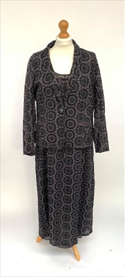 Lot 3070 - A matching dress, slip and jacket set in faded...