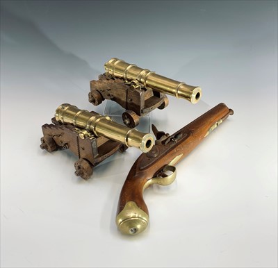 Lot 105 - A pair of model 32 pounder muzzle loading...