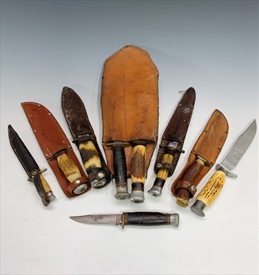 Lot 203 - A collection of nine sheath knives, mainly...