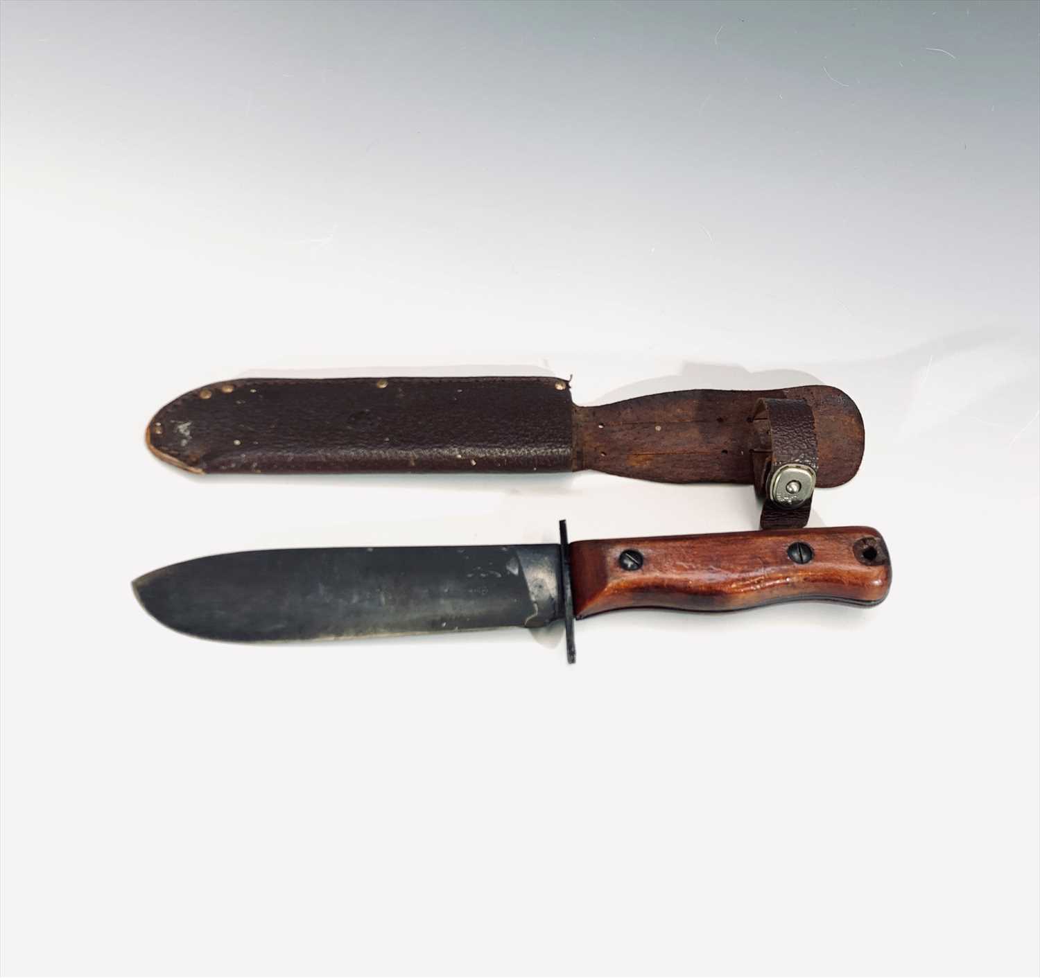 Lot 206 - A small military machete, the blade stamped