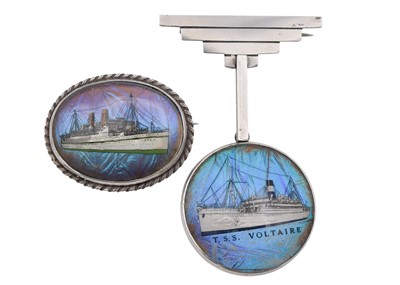 Lot 119 - Two silver inset butterfly wing ship image brooches.