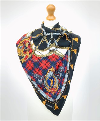 Lot 3084 - A black silk scarf with polo pony and...