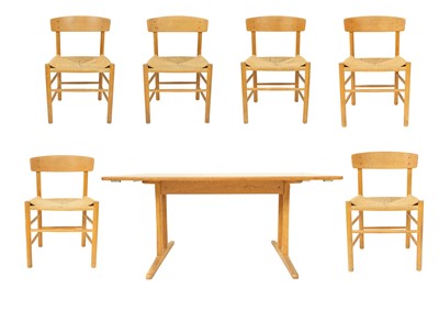 Lot 696 - Danish dining table and chairs designed by Borge Mogensen .