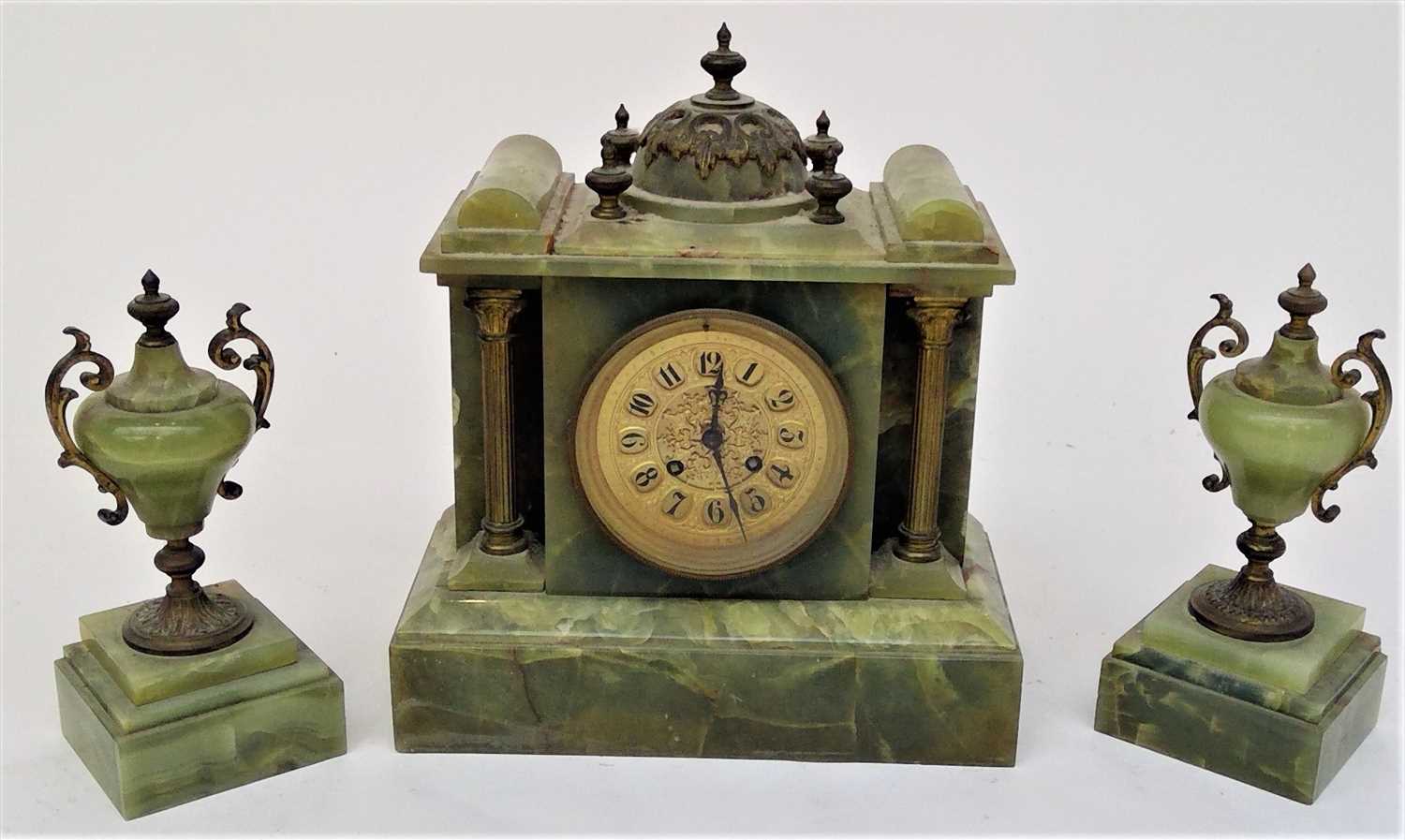 Lot 3311 - A Victorian onyx clock garniture, the circular...