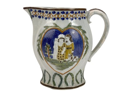 Lot 366 - A Pratt ware jug, circa 1800.