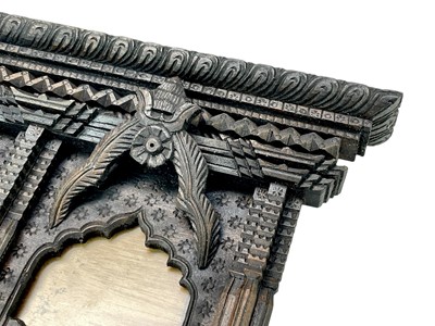 Lot 84 - An ornate Eastern hardwood triple frame.