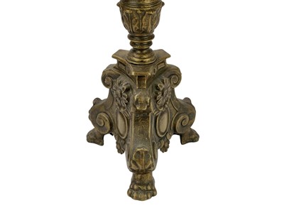 Lot 24 - Two similar brass pricket altar candlesticks.