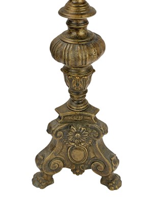 Lot 24 - Two similar brass pricket altar candlesticks.
