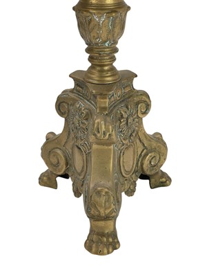 Lot 24 - Two similar brass pricket altar candlesticks.