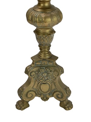 Lot 24 - Two similar brass pricket altar candlesticks.