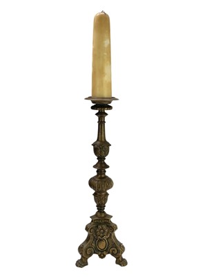 Lot 24 - Two similar brass pricket altar candlesticks.