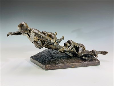 Lot 144 - A bronzed figure group of rugby players,...