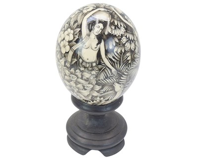 Lot 25 - A decorative Balinese painted ostrich egg.