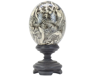 Lot 25 - A decorative Balinese painted ostrich egg.