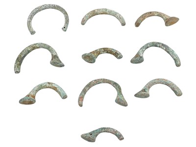 Lot 183 - A collection of sea excavated slave trade manilla bangles.