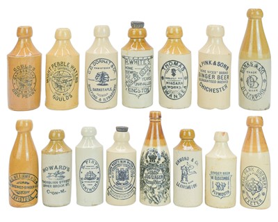 Lot 444 - A collection of stoneware bottles, mostly ginger beer.