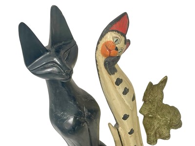 Lot 67 - A carved wood Egyptian-style cat.