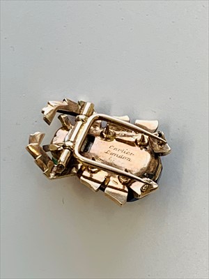 Lot 2595 - A Cartier beetle brooch, the abdomen in lapis...