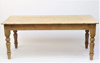 Lot 3481 - A large pine kitchen table, the rectangular...