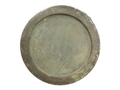 Lot 83 - A large early Victorian plain copper charger.