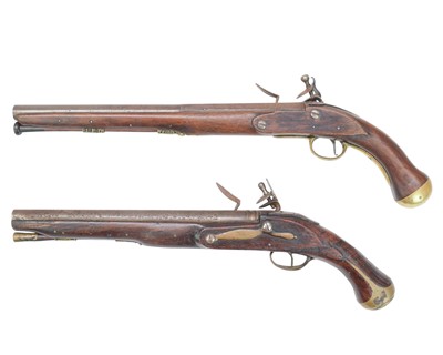 Lot 273 - Two reproduction brass mounted flintlock pistols.