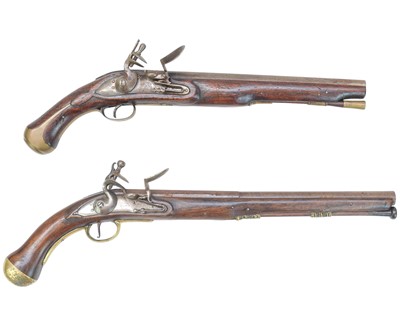 Lot 273 - Two reproduction brass mounted flintlock pistols.
