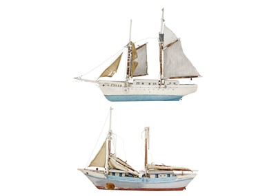 Lot 238 - Two Continental folk art painted model boats.