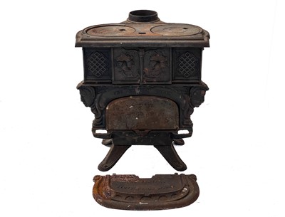 Lot 878 - A Falkirk cast iron stove.
