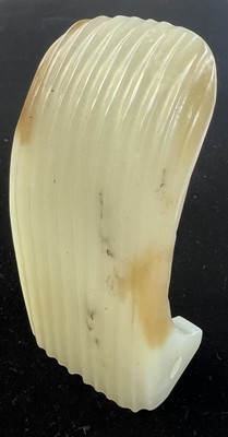 Lot 593 - A Chinese jade Mandarin hat fitting.