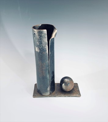 Lot 153 - A sculptural metal nut cracker, in three parts,...