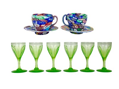 Lot 700 - A pair of Murano millefiori cups and saucers.