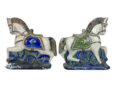 Lot 548 - Two 19th century painted pottery horses.