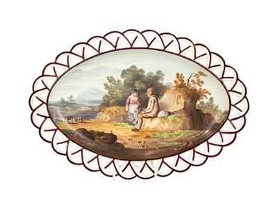 Lot 376 - A painted oval creamware reticulated dish or stand.
