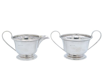 Lot 59 - A George VI silver three-piece tea set by John Rose.