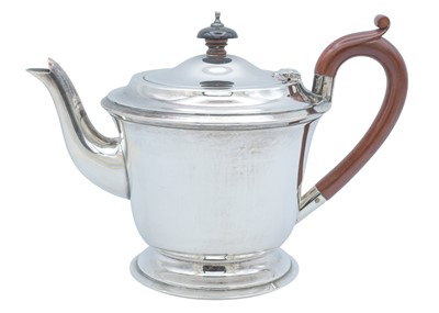 Lot 59 - A George VI silver three-piece tea set by John Rose.