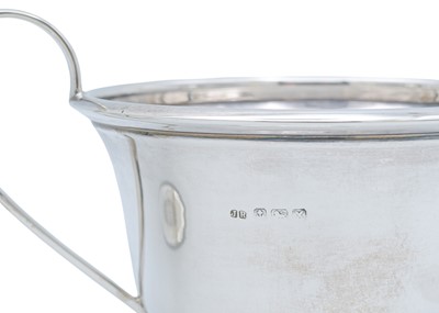Lot 59 - A George VI silver three-piece tea set by John Rose.