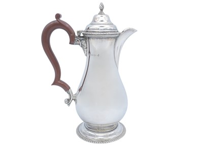 Lot 58 - A George V silver baluster coffee pot by S Blanckensee & Son Ltd.