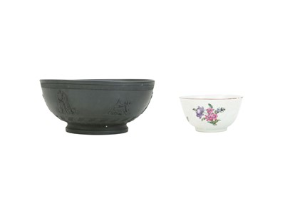 Lot 372 - A well moulded black basalt bowl.
