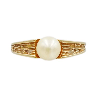 Lot 110 - A 9k gold cultured pearl solitaire ring.