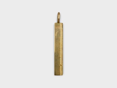Lot 156 - A 9k gold 'ruler' charm pendant.