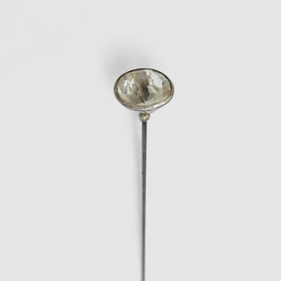 Lot 111 - A CHARLES HORNER silver and paste set hat pin.
