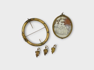 Lot 155 - A large gold-plated shell cameo locket pendant and a loose frame.