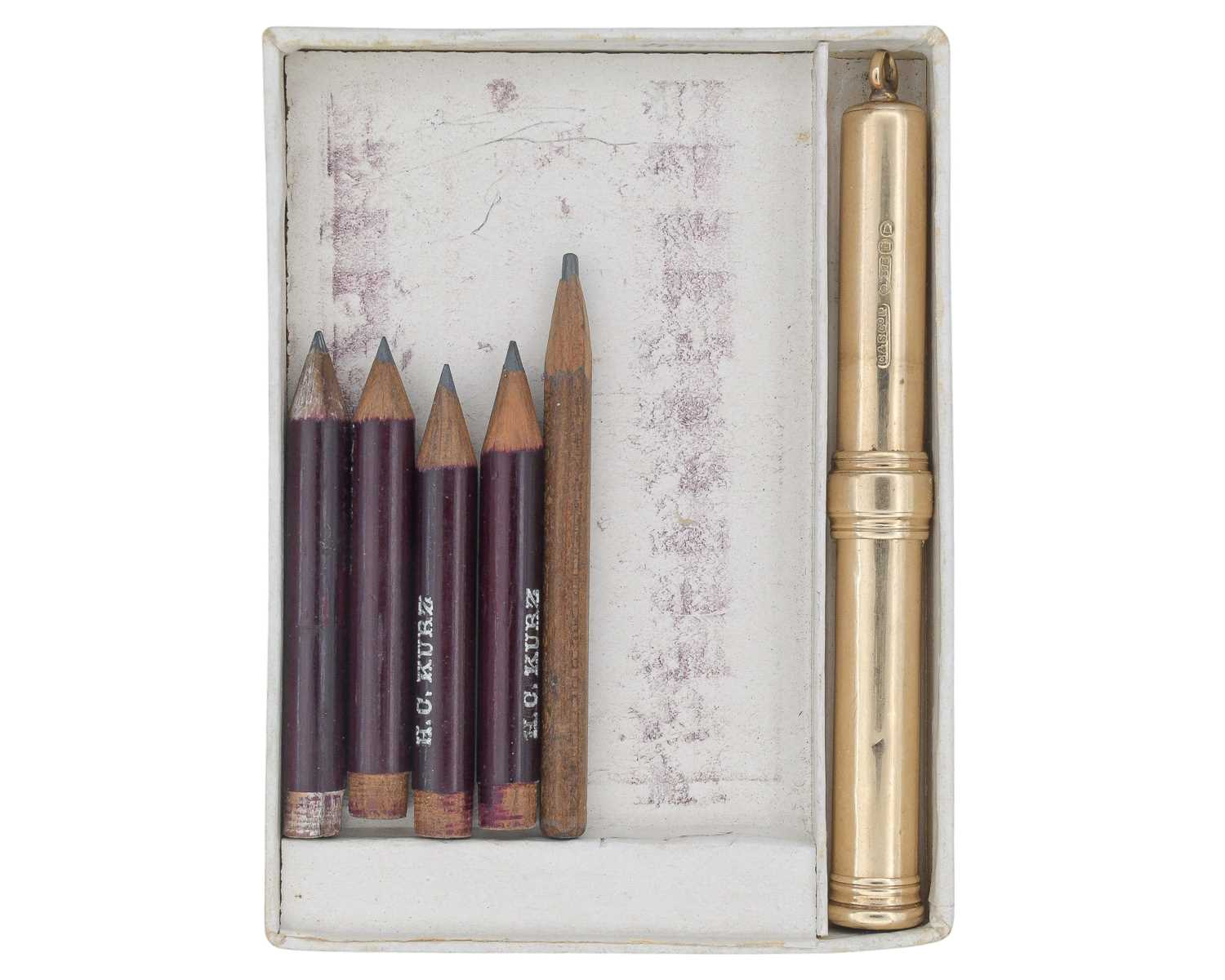 Lot 1144 - A 9k propelling pencil fob by Goldsmiths & Silversmiths Co Ltd, within original box.